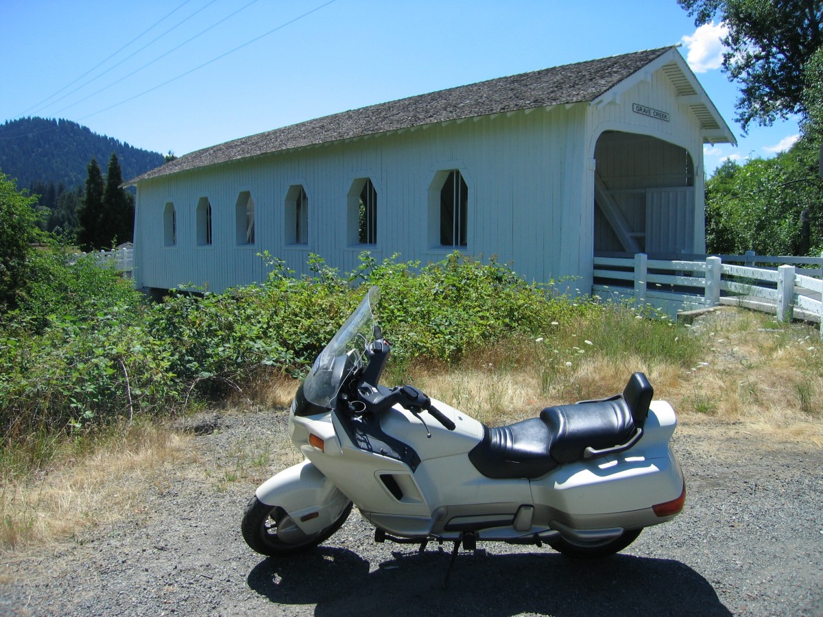 My Honda Pacific Coast visiting the Grave Creek Covered Bridge.